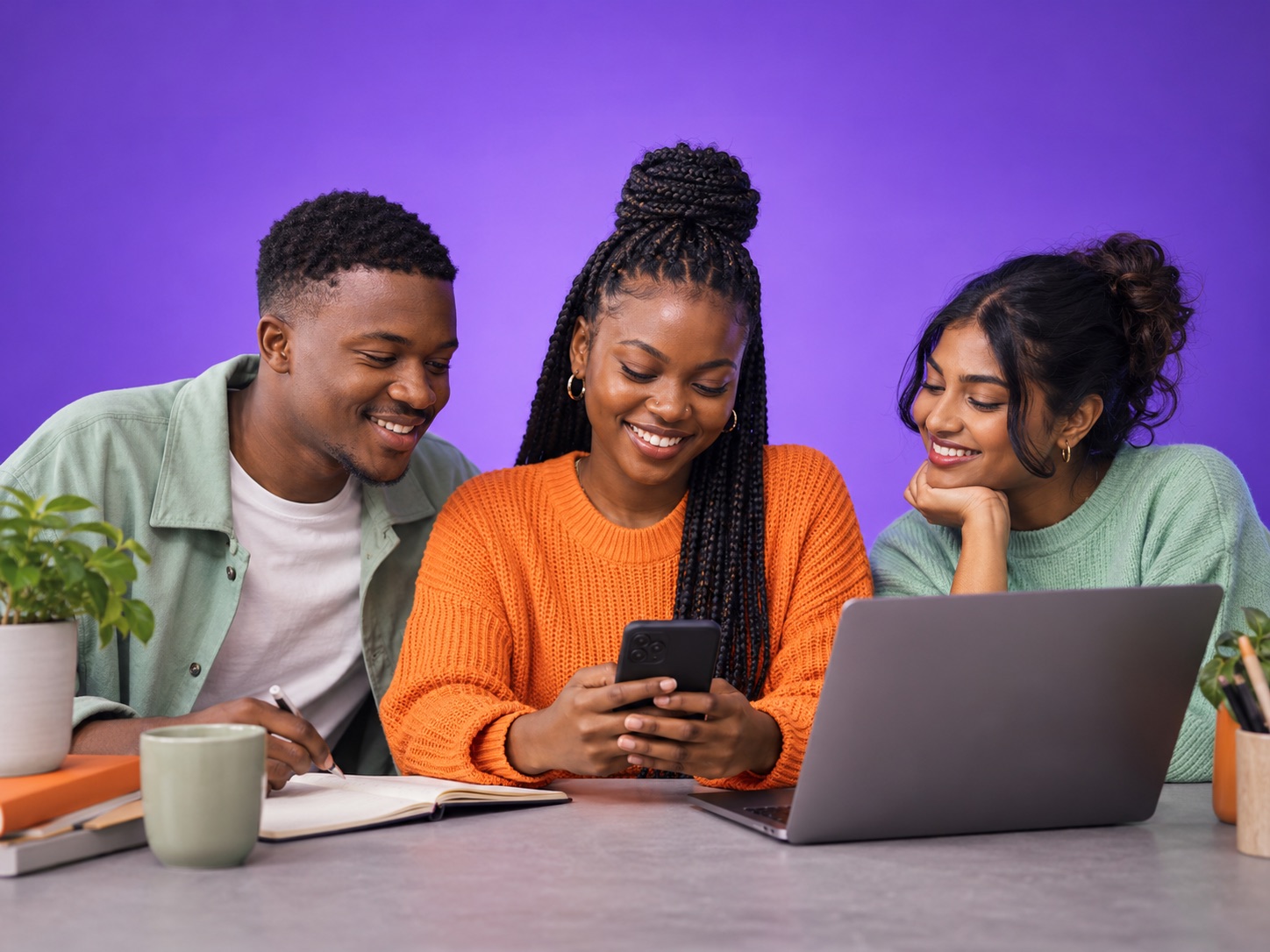 Illustrative youth campaign visual: young adults collaborating with a phone, notebook and laptop